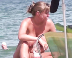 Young nudist beauties secretly filmed by voyeur having fun
